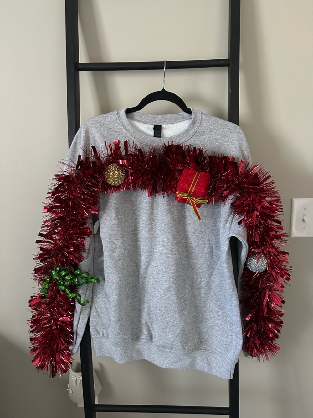 Grey Crewneck Sweater with Red Tinsel Holiday Accent
